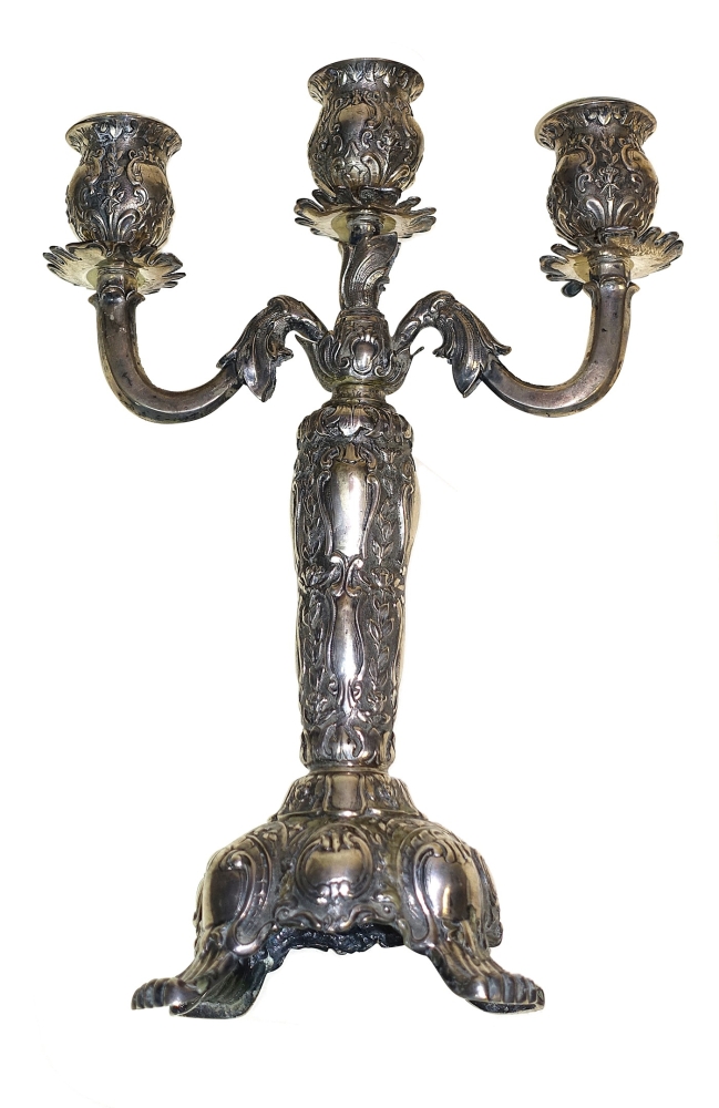 Three-armed silver candlestick